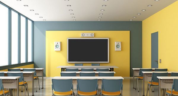 Classroom with yellow walls and blue chairs